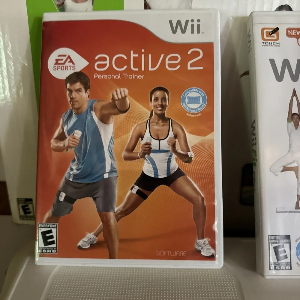 Nintendo Wii Fit Balance Board With Wii Fit Plus, Active 2, And Zumba Fitness